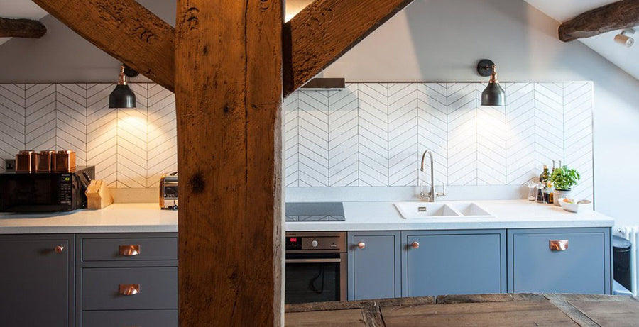 rustic kitchen interior with wooden beams and industrial wall lights