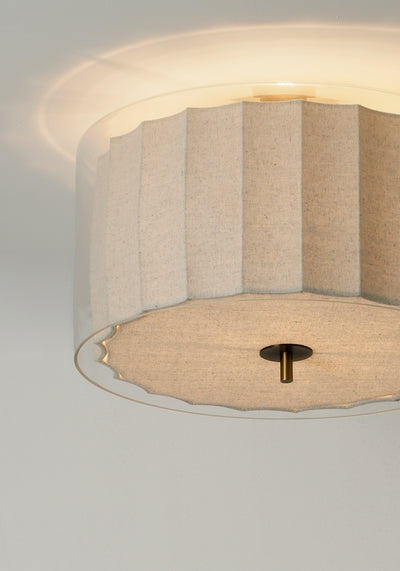 Bude Circular Flush Mount with Linen and Clear Glass shades, lit up