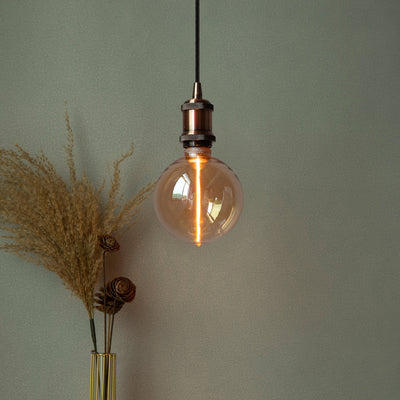 3.5W E27 LED single filament dimmable bulb in amber finish