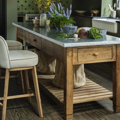 Hamble Counter Height Stool featuring a Natural Wooden Frame with Backrest and a Seat Upholstered in Easy-Clean Natural Chenille