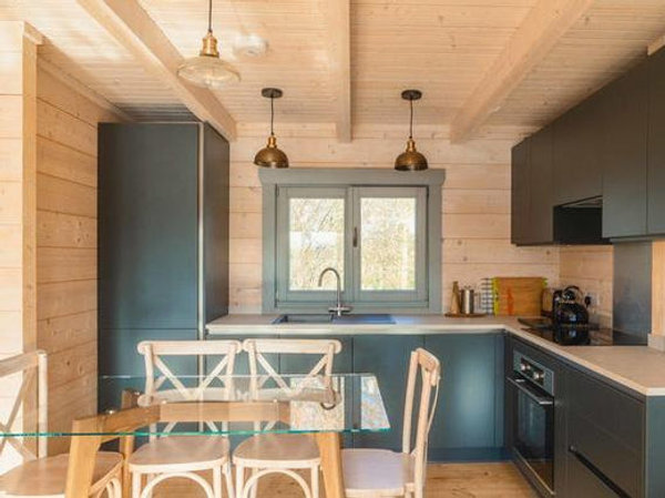 A simplistic kitchen interior with wooden features
