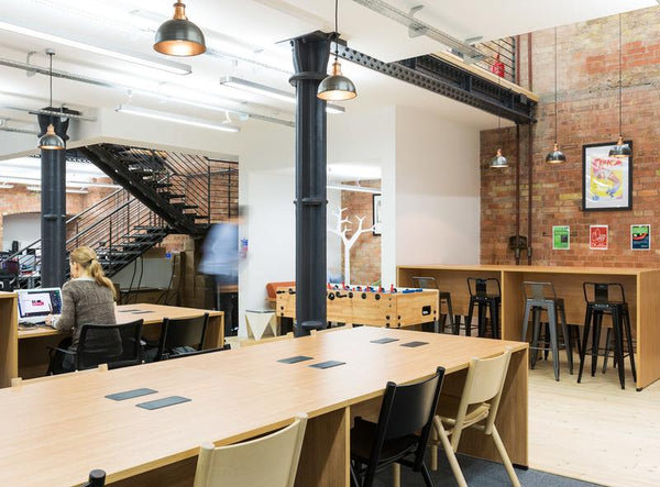 A modern business interior with industrial lighting