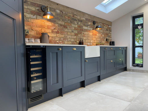 Open plan kitchen interior with industrial lights
