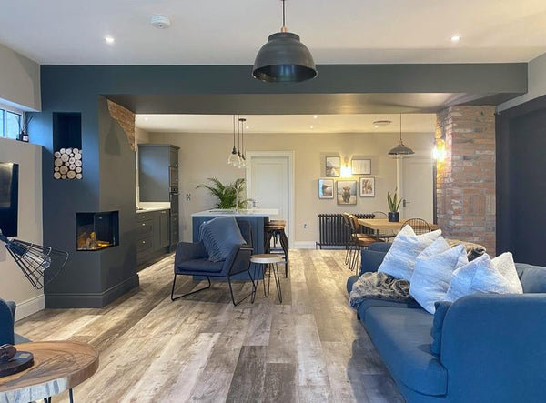 A living room interior with coloured walls