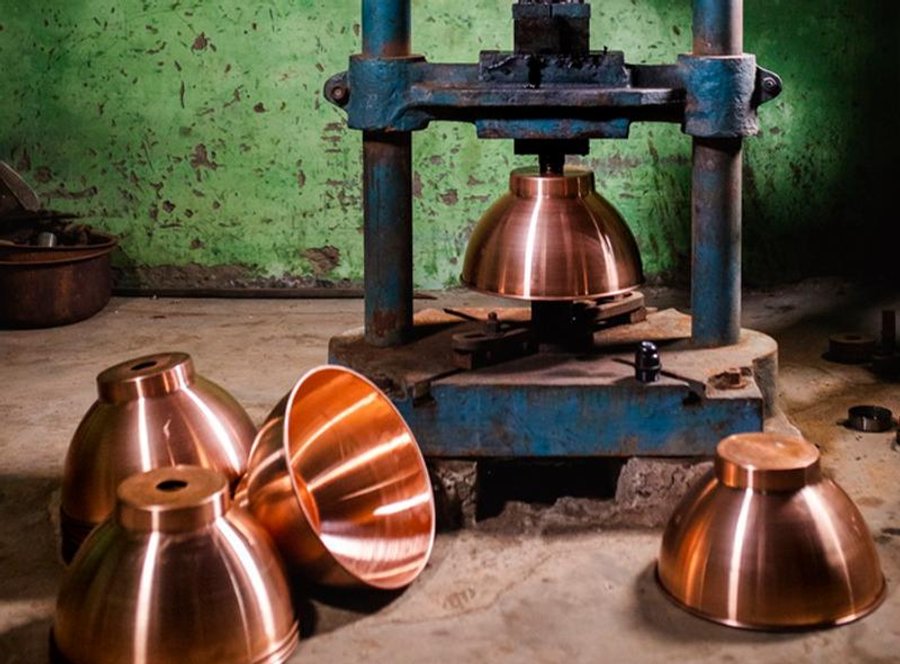 Copper pendant being handcrafted