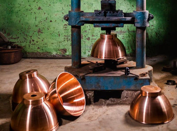 Copper pendant being handcrafted