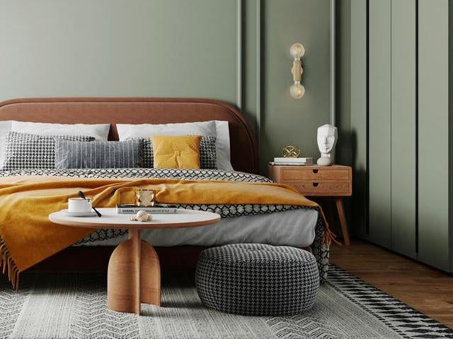 A bedroom decorated with earthy colours 