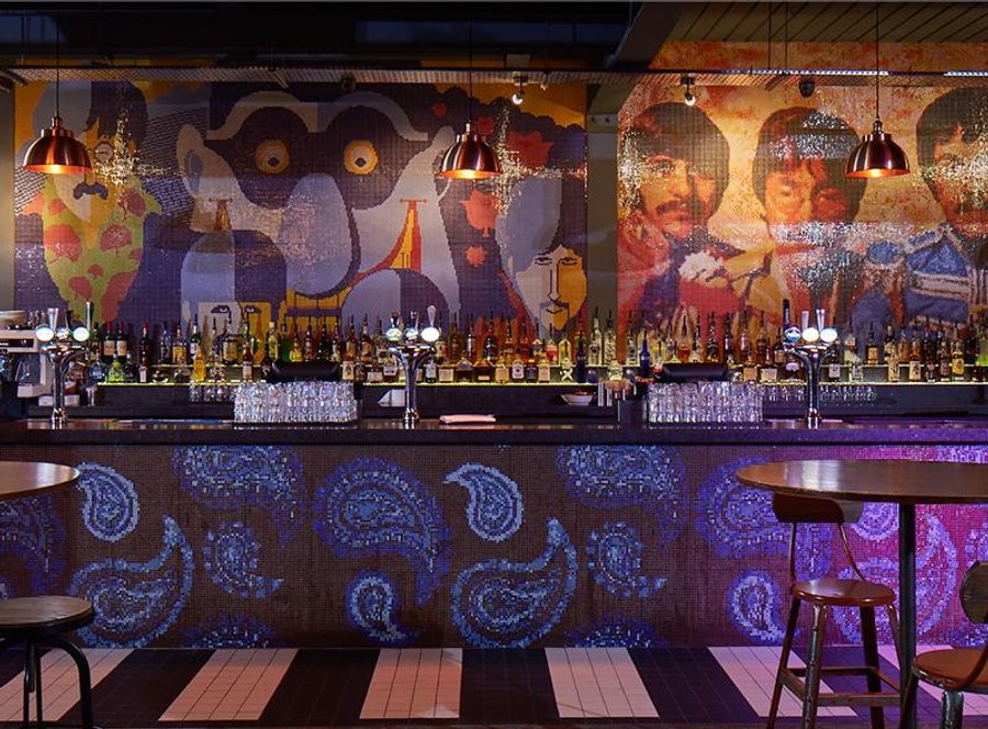 Bar interior with abstract design and industrial lighting
