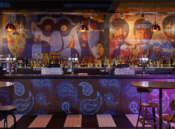 Bar interior with abstract design and industrial lighting