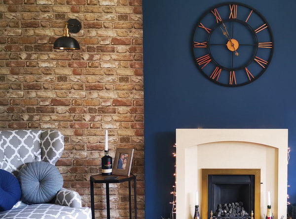 A home interior with brick and blue walls
