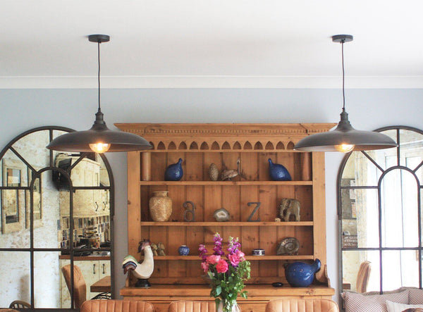 A traditional home interior with industrial lighting