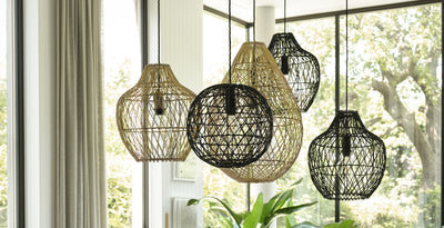 odern decorative lighting with a cluster of rattan pendant lights in natural and black finishes, bringing texture and style to a bright contemporary space.