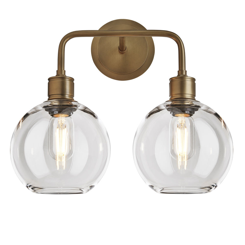 Albany Glass Globe Double Wall Light - 7 Inch - Clear, featuring two round glass globes with a brass finish, front view