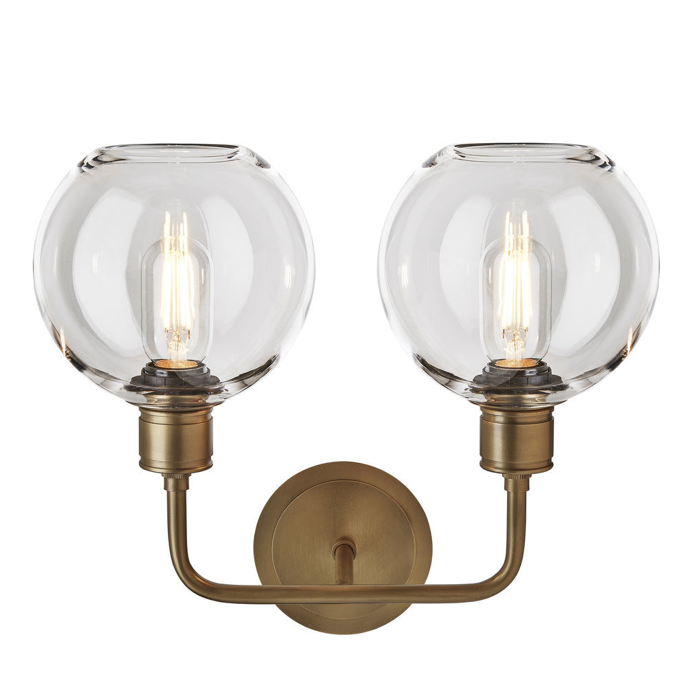 Albany Glass Globe Double Wall Light - 7 Inch - Clear, featuring two round glass globes facing upwards with a brass finish, front view