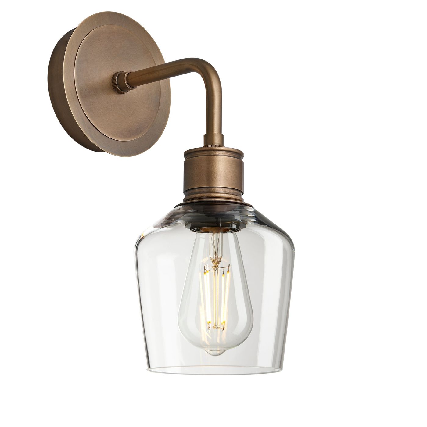 Albany Glass Schoolhouse Single Wall Light, 5.5 inches, with a clear glass shade and brass holder in an angled view