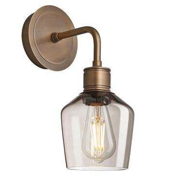 Albany Smoked Glass Schoolhouse Single Wall Light, 5.5 inches, with a mocha glass shade and brass holder in a side view