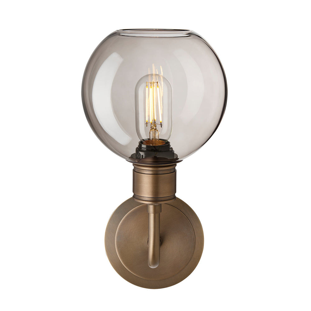 Albany Glass Globe Single Wall Light with a 7 inch mocha glass globe shade facing upwards and brass holder shown in a straight on view