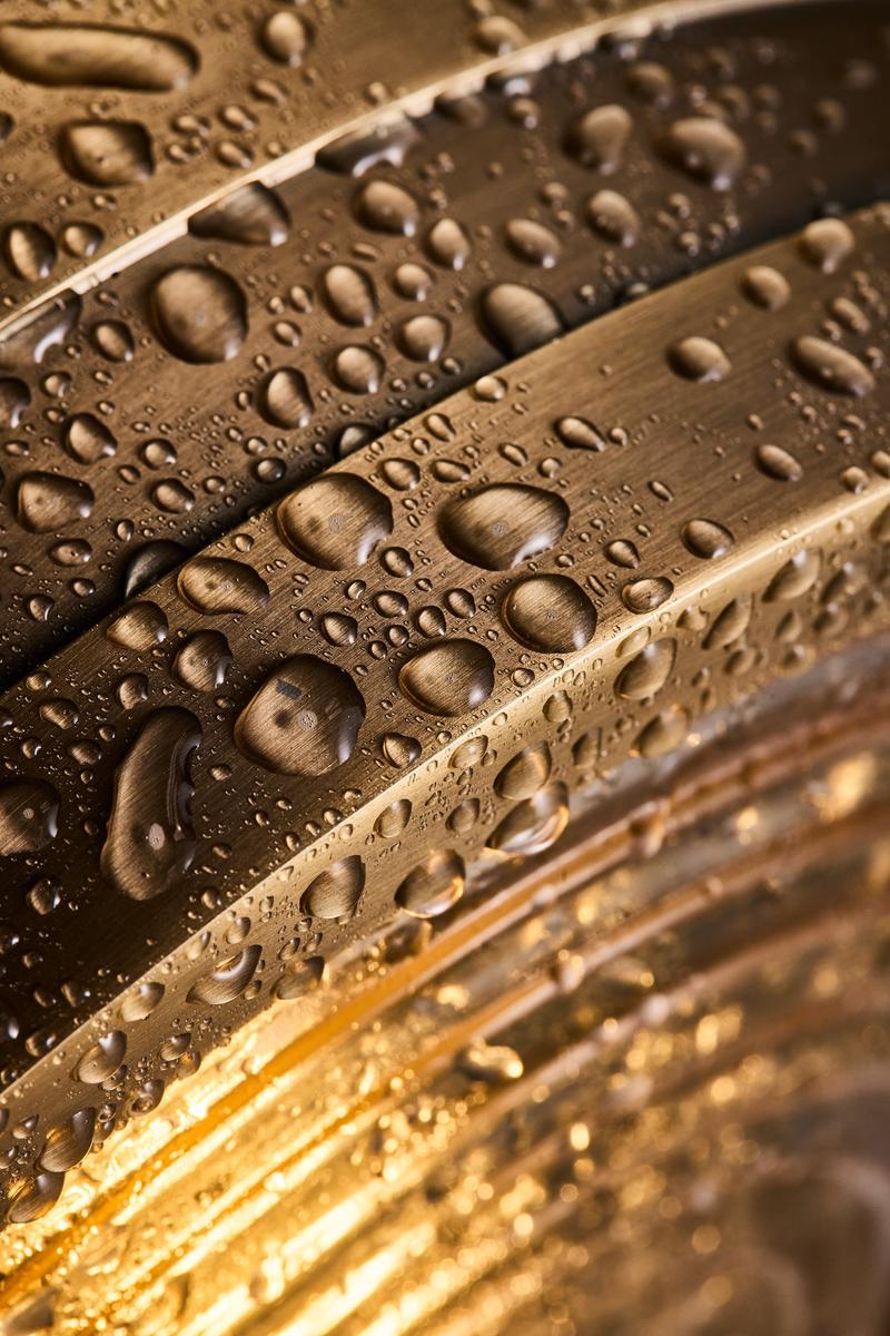 Bulkhead Outdoor & Bathroom Round Wall Light in Brass finish with Ripple Glass lit up