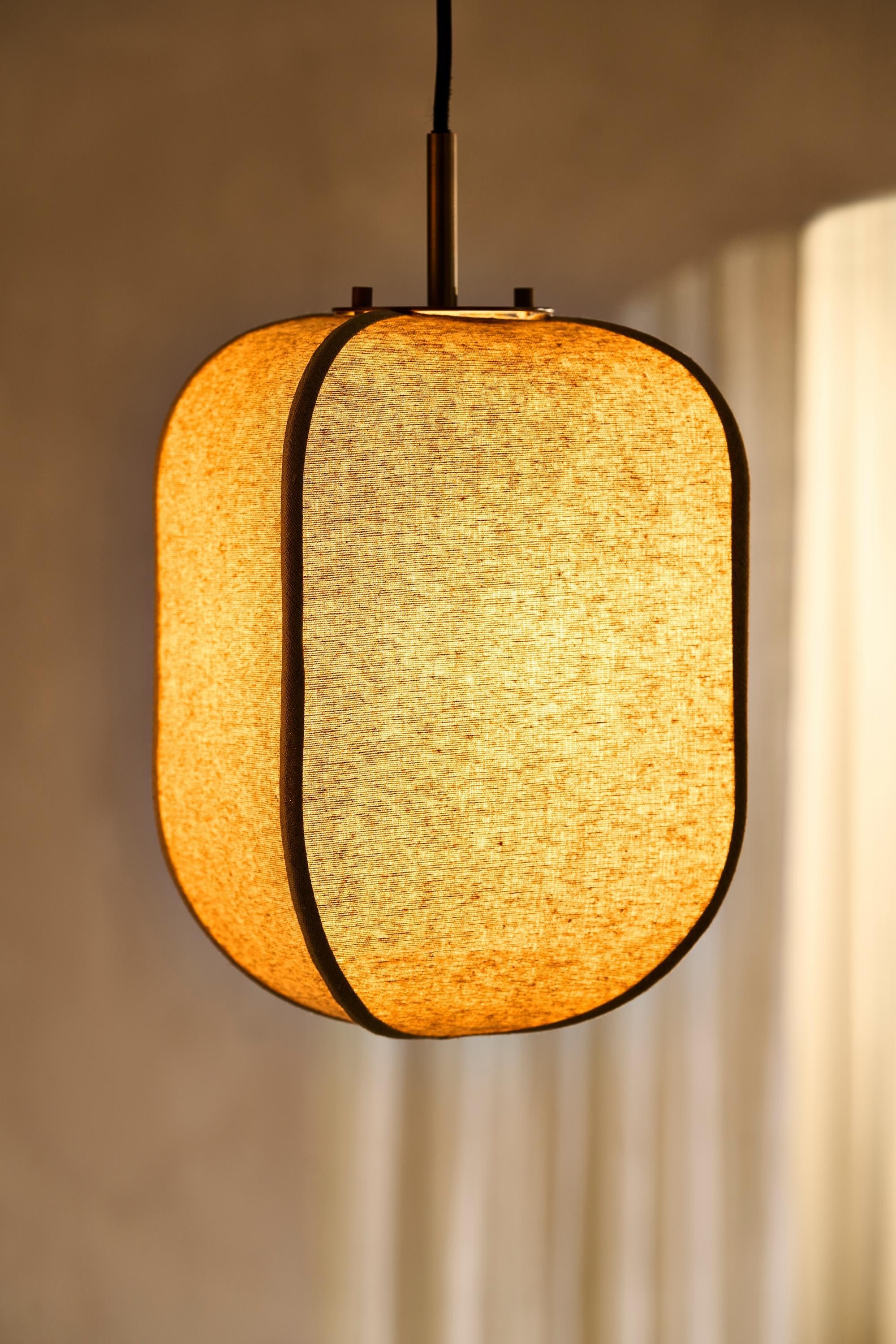 Bloxham Rectangular Pendant Light in Natural lit up