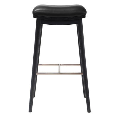 Back view of a bar stool with a black leather seat and black ash wood legs, showcasing the brushed metal footrest.