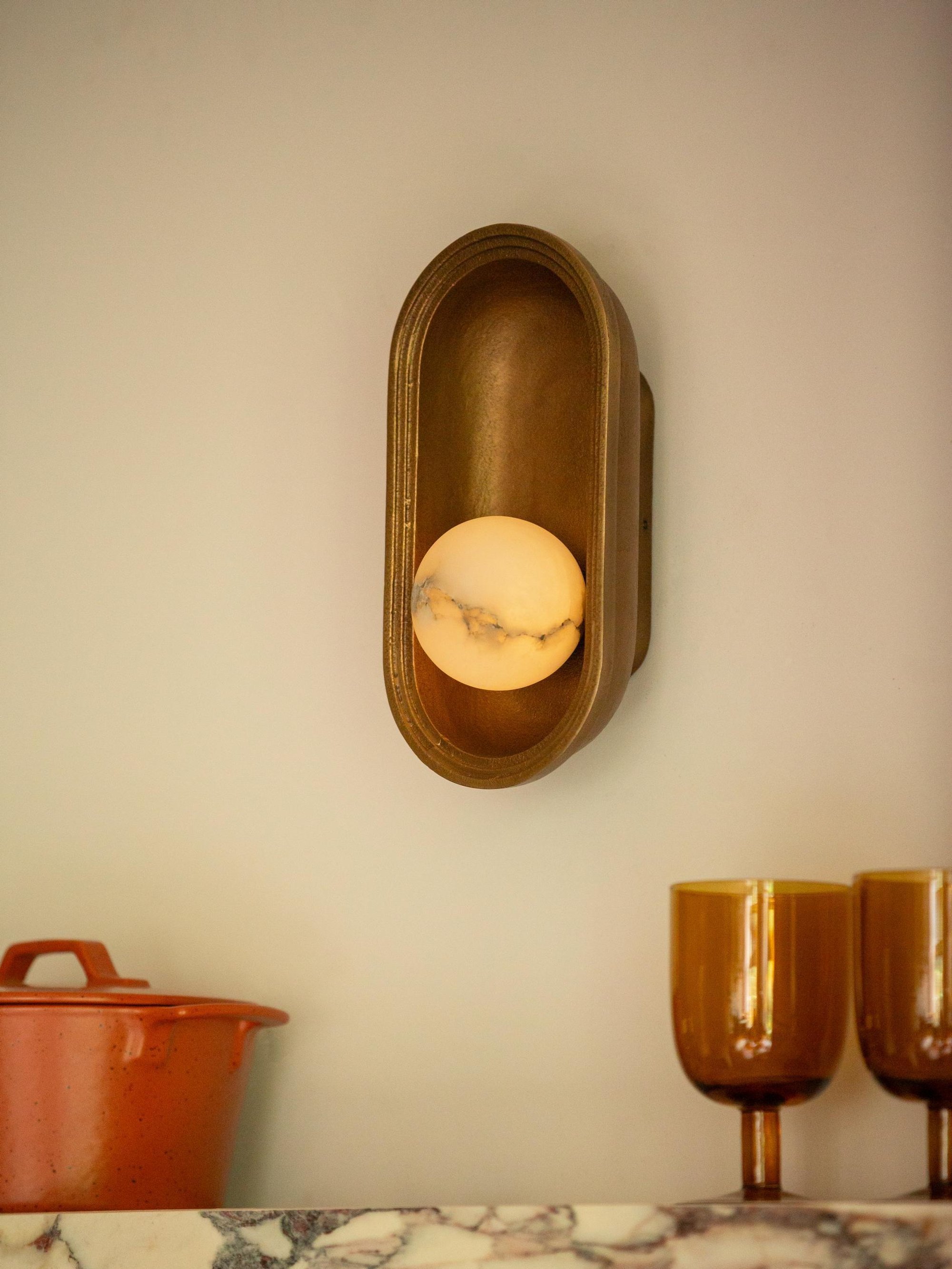 Corby Cast & Alabaster Oval Wall Light 5 Inch in Aged Brass Lit Up