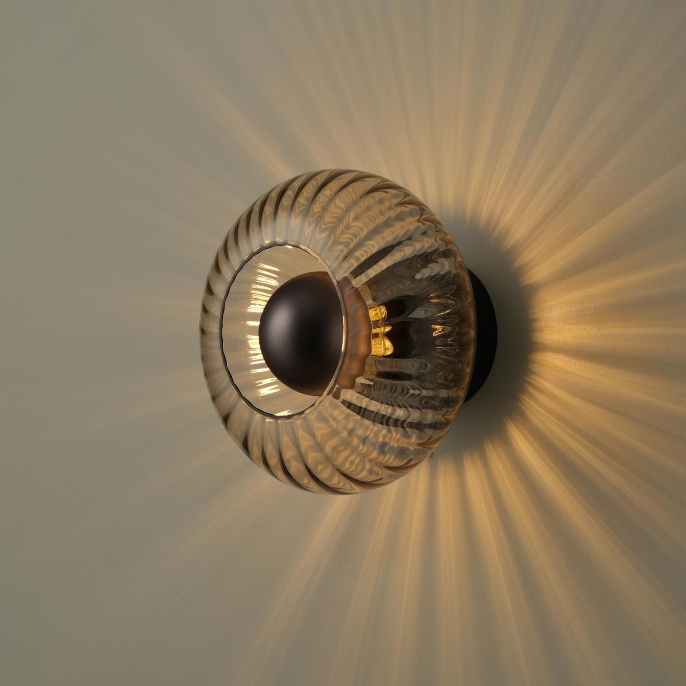 Chelsea Glass Round Diffuser Wall Light Flush Mount with Ribbed Mocha Glass and Bronze Wall Holder lit up