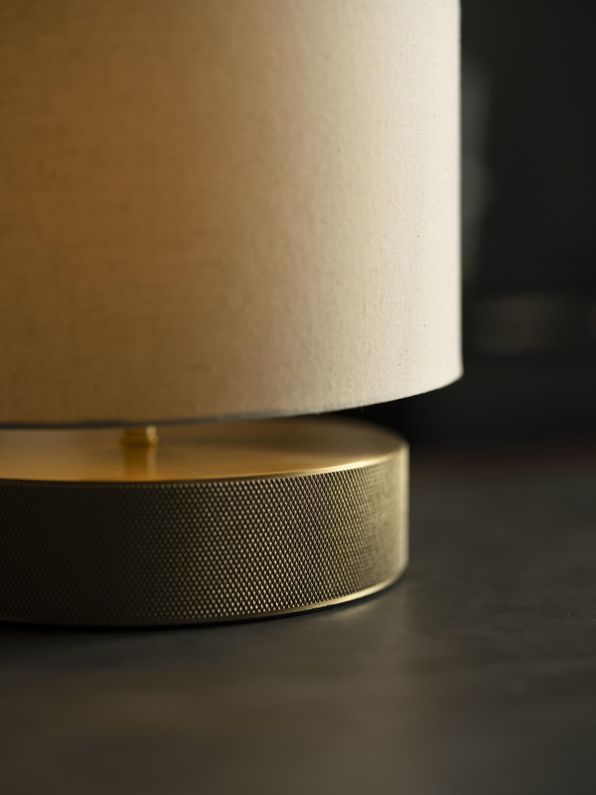 Knurled Round Table Lamp in Brass Finish with a Natural Cotton Drum Shade