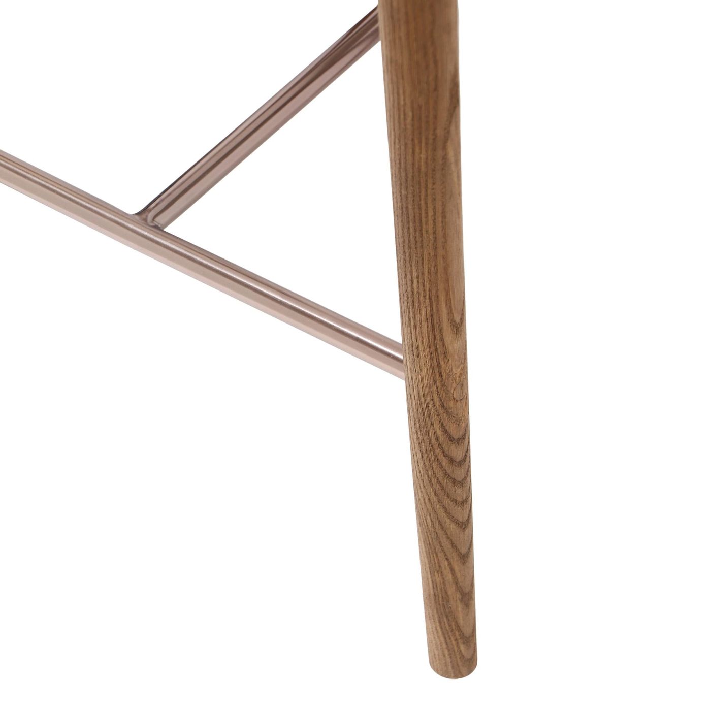 Detail view of the brushed metal footrest on a counter height stool with natural ash wood legs, highlighting the contrast between materials