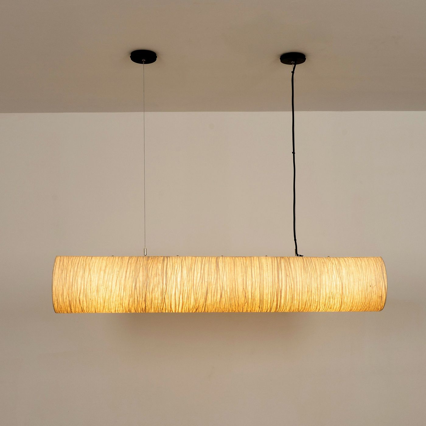 Epping Tube Paper Pendant Light in Ivory in large size lit up