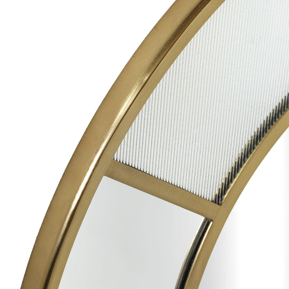 Close up of Fenton round wall mirror with aged brass frame, 31-inch