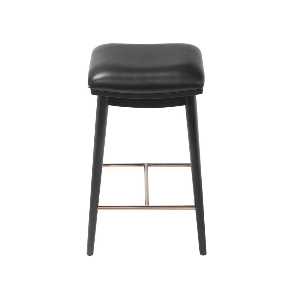 Front view of a counter height stool featuring black ash wood legs, a black soft leather seat, and a brushed metal footrest