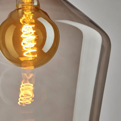 Smoked Mocha Glass Shade close up with lit up spiral bulb