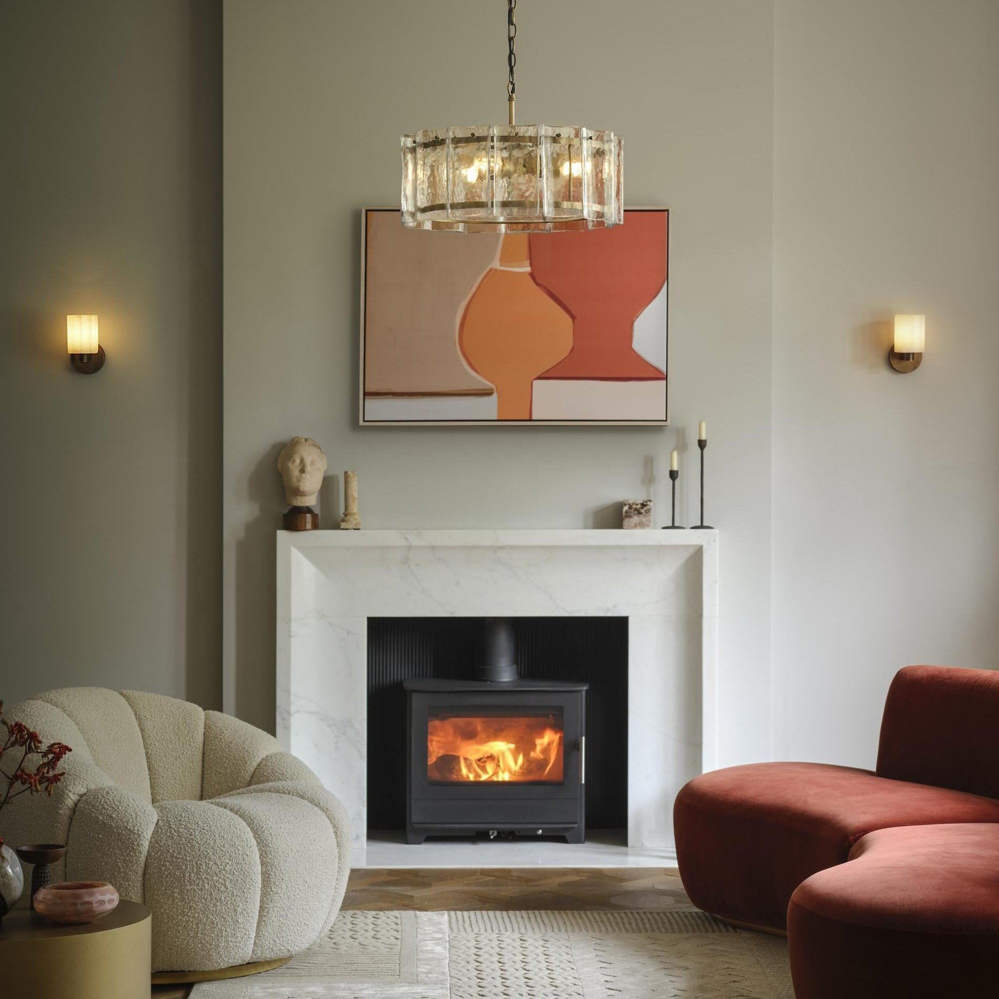 Corby Cast Alabaster Fluted Wall Light in 4 Inch in Aged Brass Finish and Amberley Chandelier Lit Up in  Living Room 