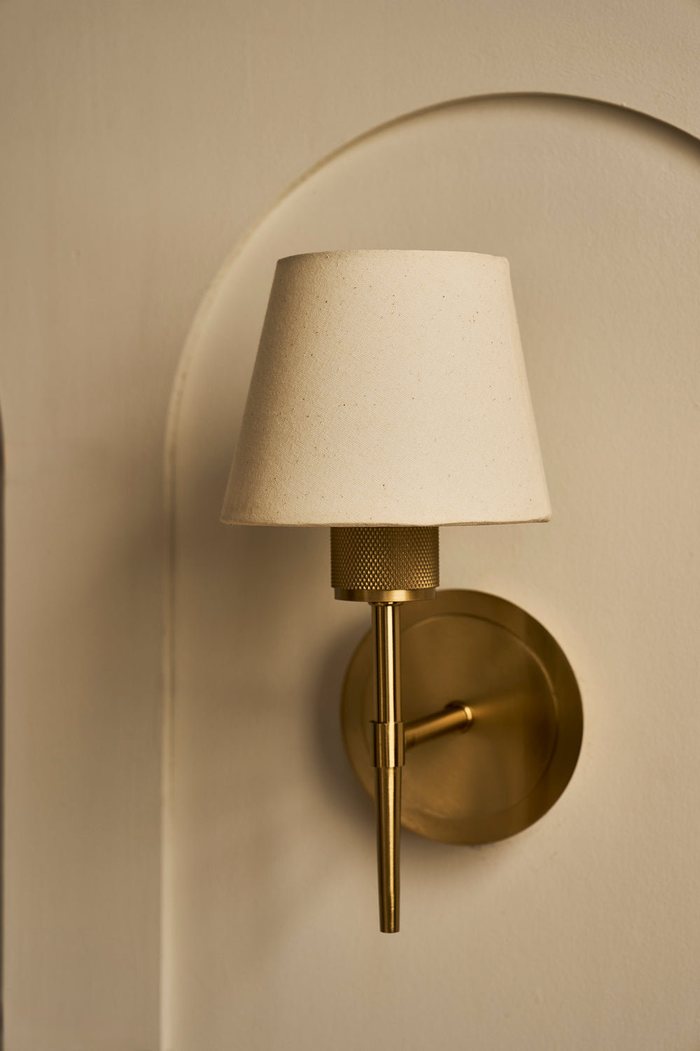 Brass Knurled Empire Torch Wall Light with Light Natural Cotton shade