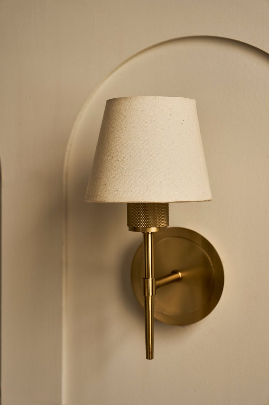 Brass Knurled Empire Torch Wall Light with Light Natural Cotton shade