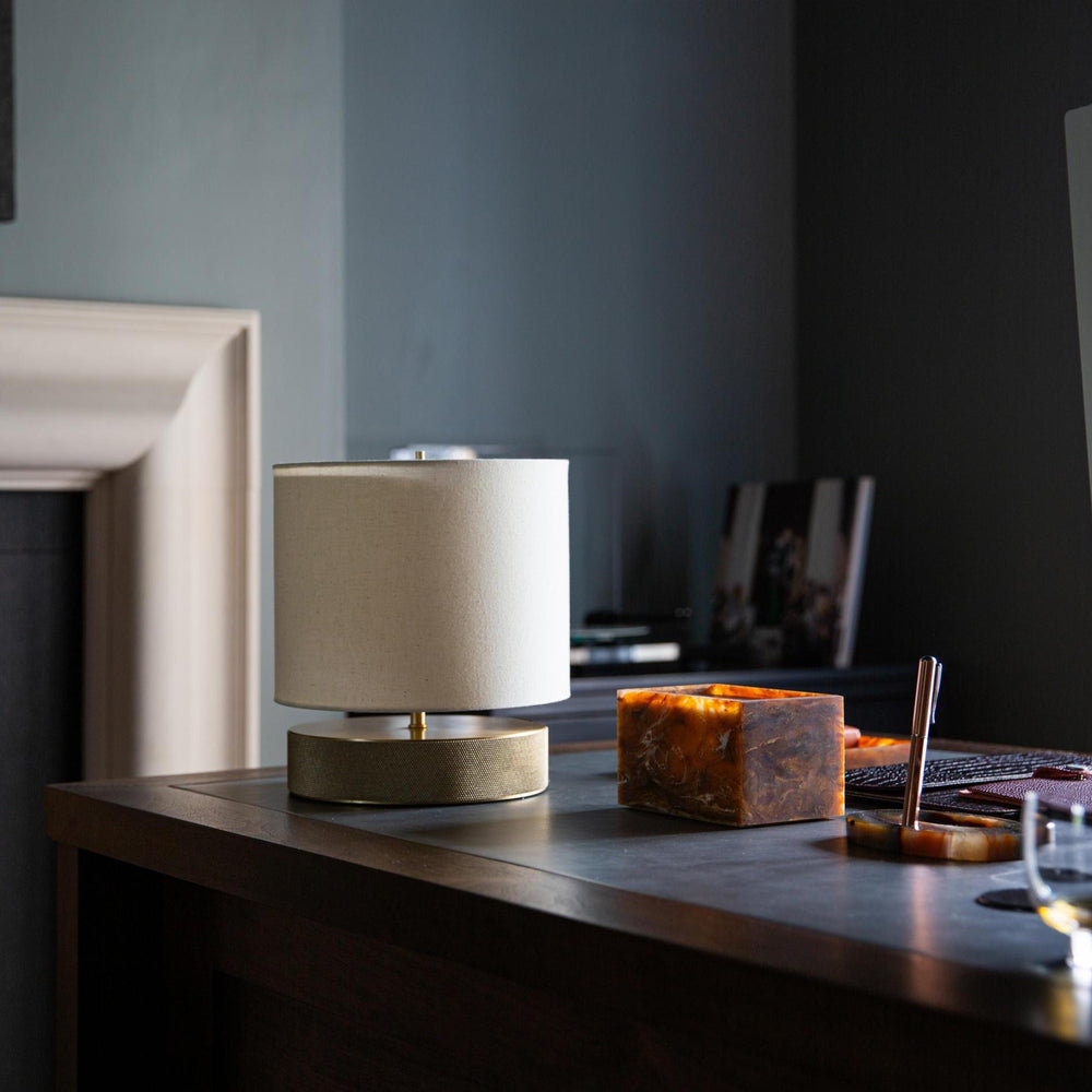 Knurled Round Table Lamp in Brass Finish with a Natural Cotton Drum Shade
