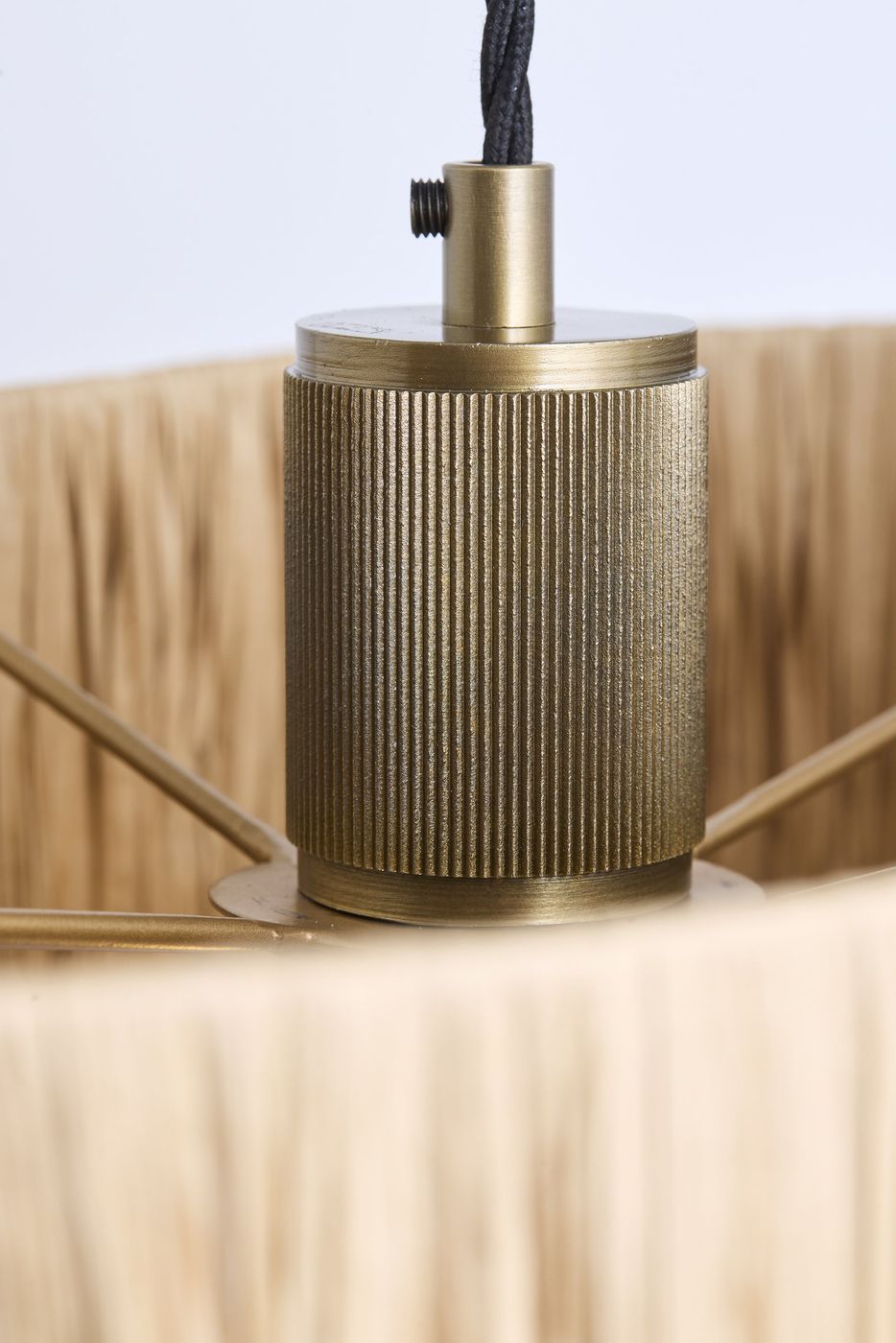 Close up of Brass Ribbed Holder of the Raffia Layered Pendant Light in Natural Colour