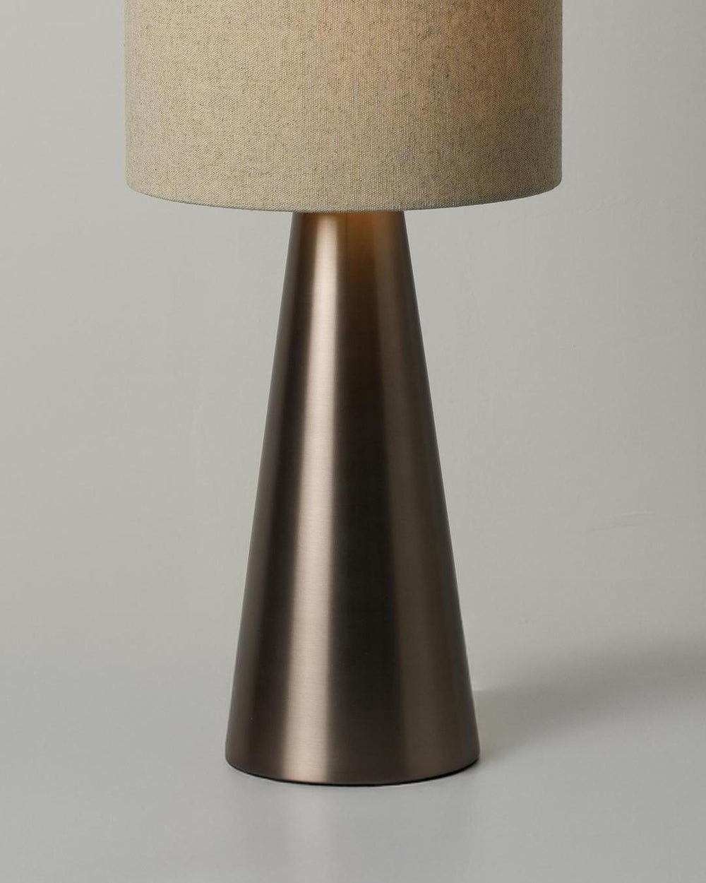 Thornham Cone Table Lamp in Bronze lit up