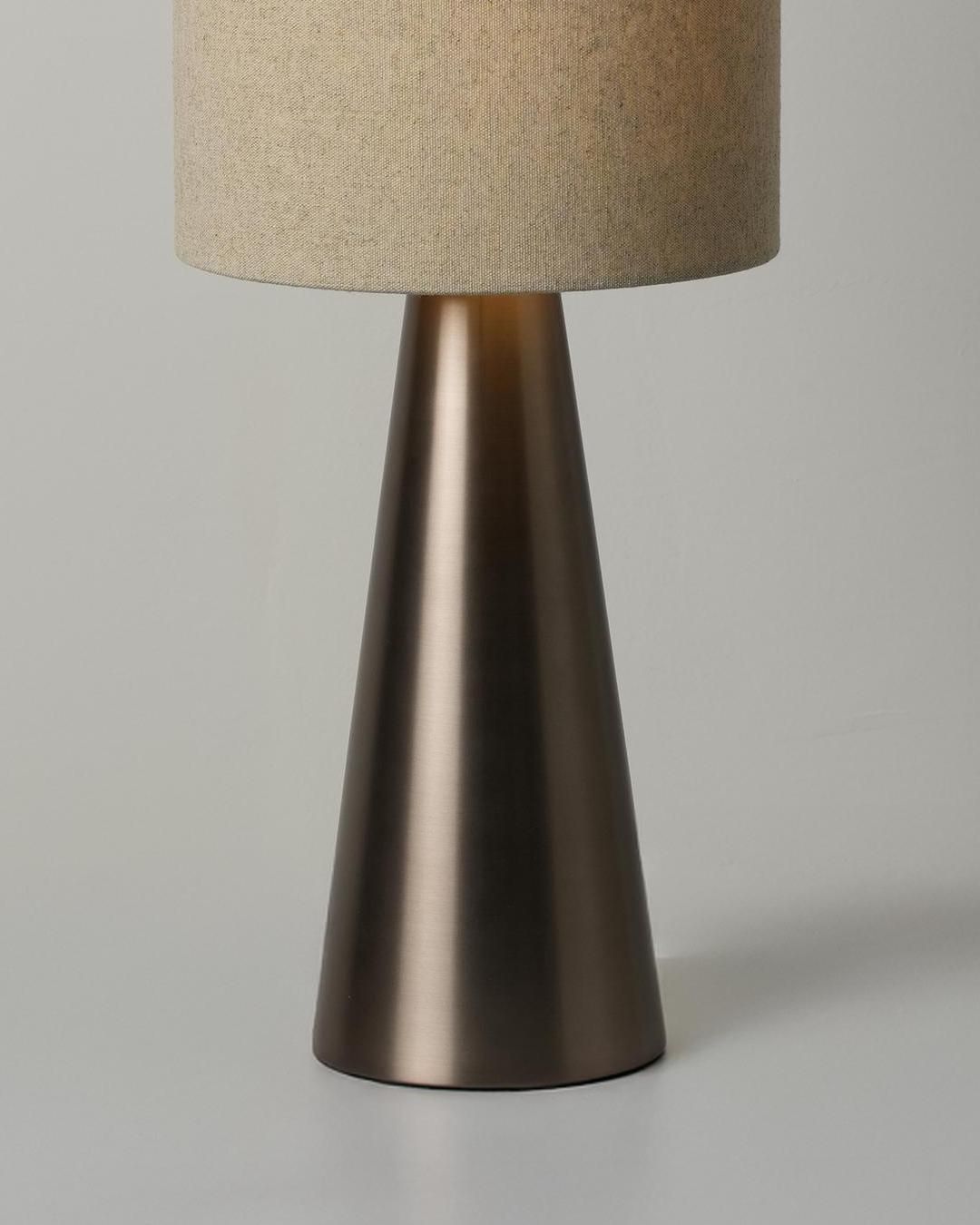 Thornham Cone Table Lamp in Bronze lit up