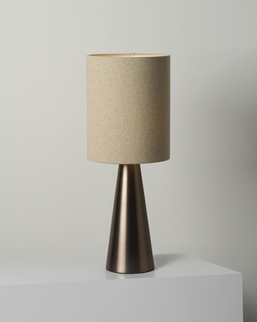 Thornham Cone Table Lamp in Bronze lit up
