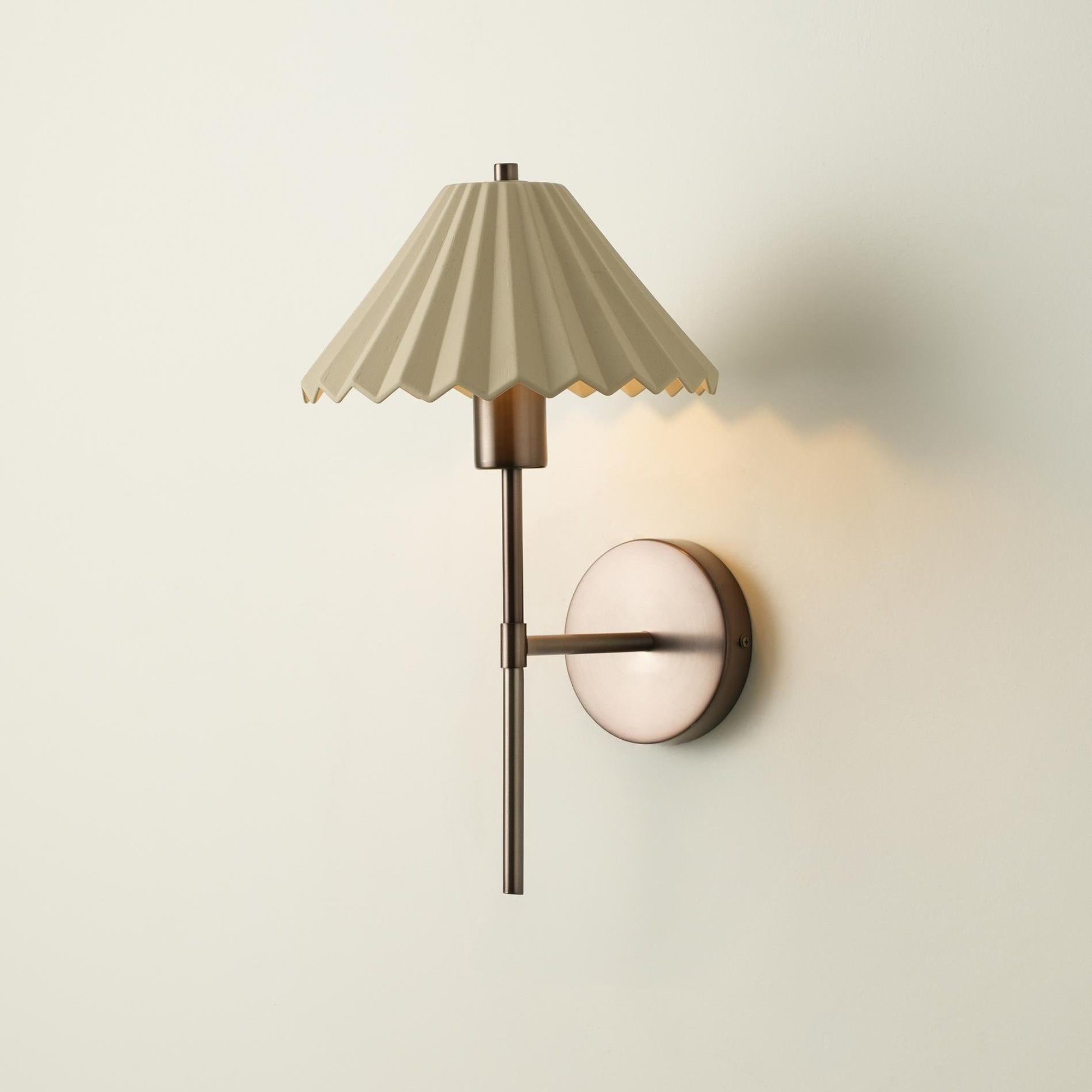 Wycombe Ceramic Umbrella  Pleated Wall Light in Natural finish lit up