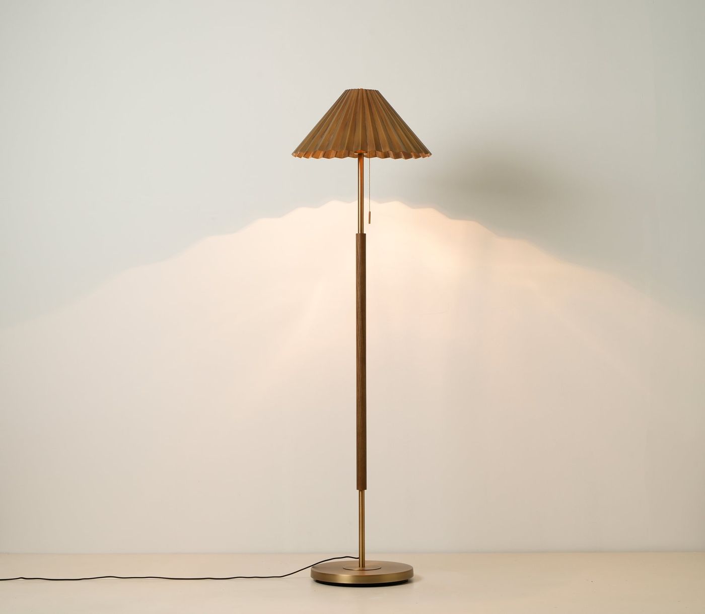 Wycombe Umbrella Pleated Floor Lamp in Brass lit up
