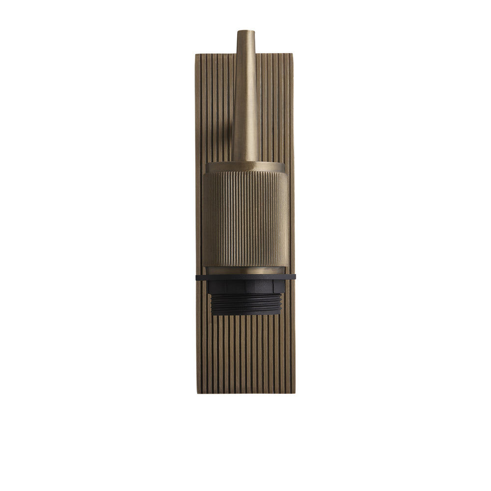 Wall light with a brass finish shown from a side view, highlighting ribbed details without a lampshade