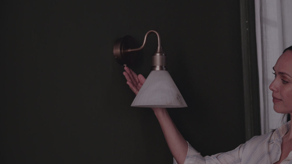 Noho Alabaster 7 Inch Fluted Funnel Swan Neck Wall Light gets switched on