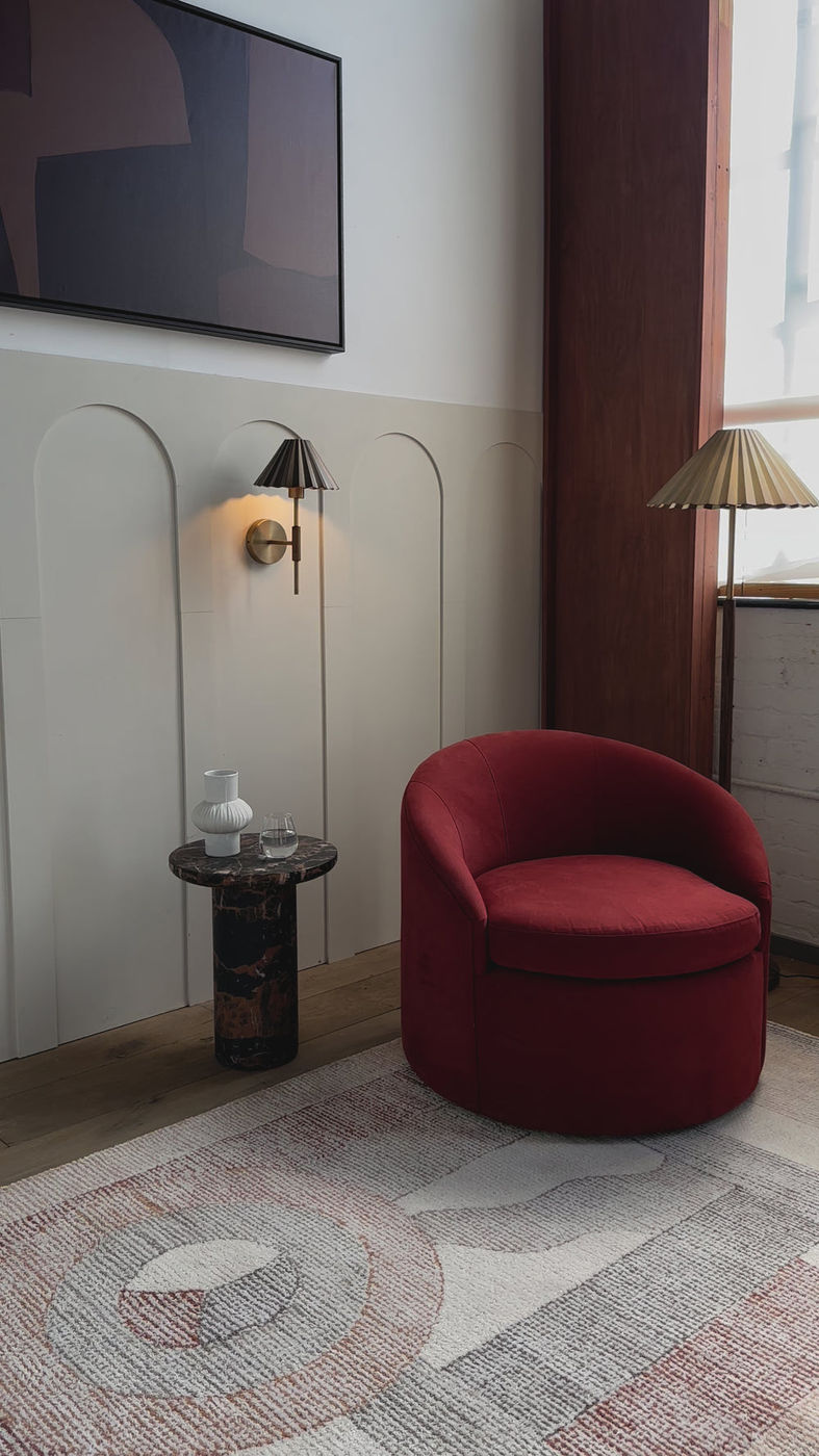 Video featuring Riston rug, brass wall light and brass floor lamp