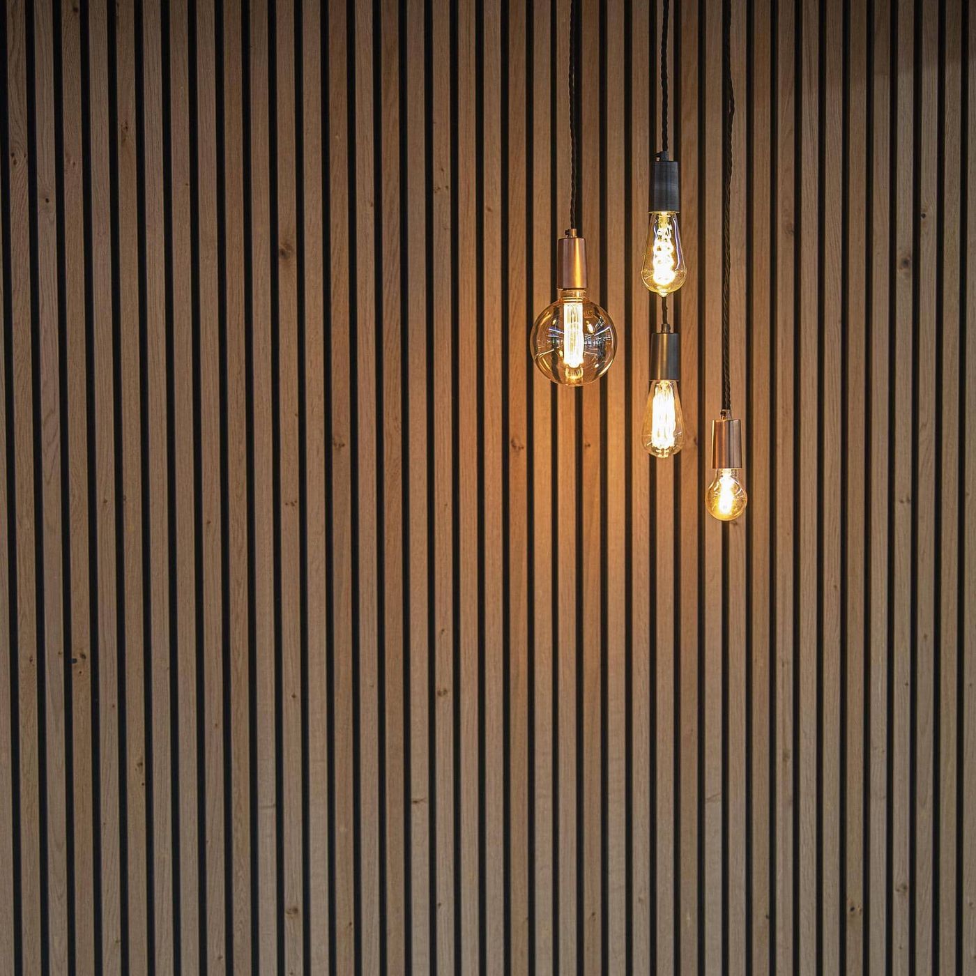 Copper and Pewter Sleek Edison Pendant Light with Bulbs displayed together 